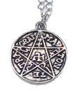 Pendant with Celtic spiral and ogham symbols.