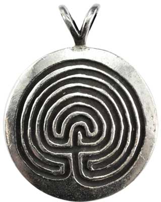 A silver pendant featuring a labyrinth design inspired by Celtic motifs.
