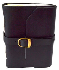 Leather-bound journal with strap closure, used for Celtic spiritual practices and teachings.
