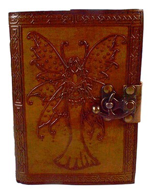 Wooden book cover with carved butterfly design, featuring a metal latch, reflecting Celtic artistry.