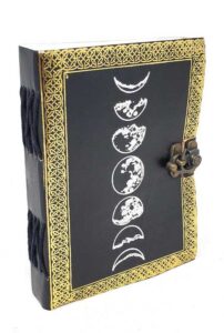 Book with Celtic moon phases symbols on cover, related to Celtic spirituality and druidry.
