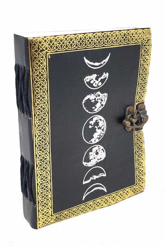 Book with Celtic moon phases symbols on cover, related to Celtic spirituality and druidry.