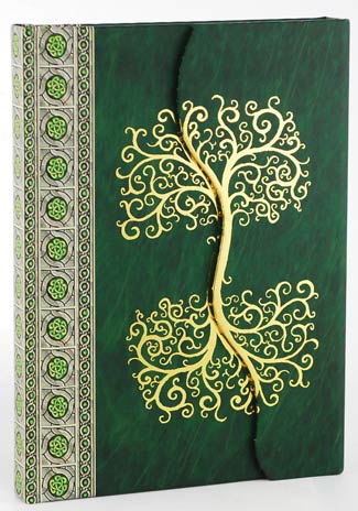 A journal with a green cover featuring a gold Celtic tree of life design and decorative border on th.