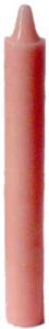 A pink candle with a pointed tip, set against a plain background.