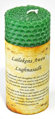 Candle with green honeycomb pattern and a yellow label with Celtic text.