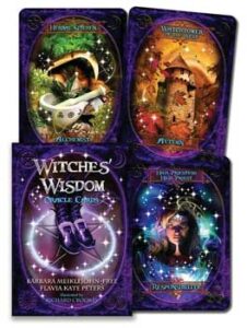 Oracle card set featuring mystical symbols and a cauldron with a forest background.
