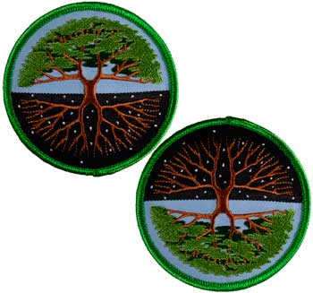 Embroidered patch featuring a tree with roots and branches, symbolizing growth and connection in Cel.
