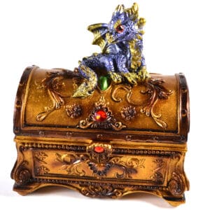 Treasure chest with a detailed dragon figurine on top, decorated with colorful gemstones.