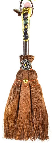 Staff with carved and decorated top, incorporating natural elements and symbols related to Celtic sp.