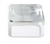 Glass sculpture with Celtic knot design and natural motifs.