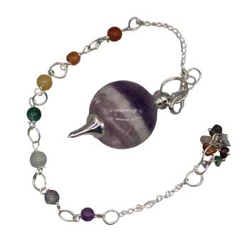 Bracelet featuring multicolored beads and a purple striped stone focal point.