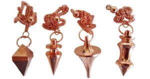Four metallic charms with geometric shapes and intricate designs, attached to chains with small bead.