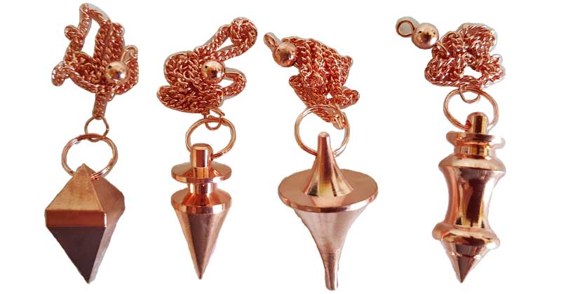 Four metallic charms with geometric shapes and intricate designs, attached to chains with small bead.