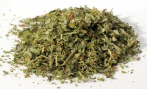 Herbal mixture with dried leaves and small twigs, used in Celtic spiritual rituals and nature-based.