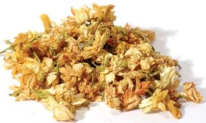 Dried flower petals, possibly for herbal or spiritual practices, on a white background.