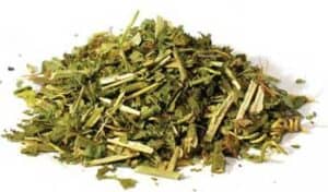 Herbal mixture with dried green leaves and stems, used in Celtic spiritual and druidic rituals.