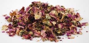 Dried rose petals and herbs for herbal remedies and spiritual practices.