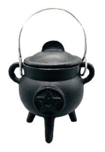 Black cauldron with a handle, used in Celtic spiritual practices and rituals.