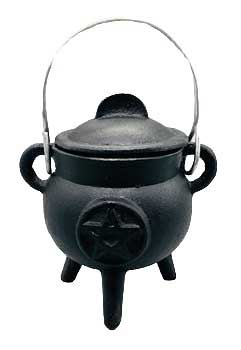 Black cauldron with a handle, used in Celtic spiritual practices and rituals.