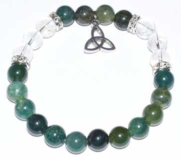 Bracelet featuring green and clear beads with a triquetra pendant, symbolizing Celtic spirituality a.