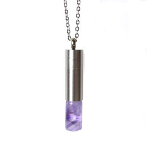 Pendant necklace with a purple gemstone and silver cap, hanging from a chain.