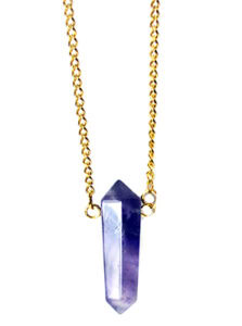 Gold chain with a blue crystal pendant.