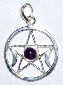 Pendant featuring a silver pentacle with a purple gemstone in the center.