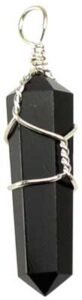 A black obsidian crystal pendant wrapped in silver wire, hanging from a metal loop.