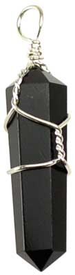 A black obsidian crystal pendant wrapped in silver wire, hanging from a metal loop.