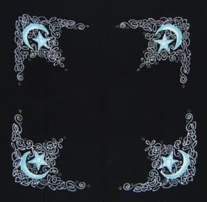 Decorative Celtic-inspired moon and star motifs with intricate swirling designs.