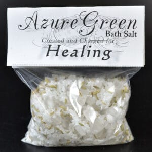 Bath salt with white crystals and gold-colored accents.
