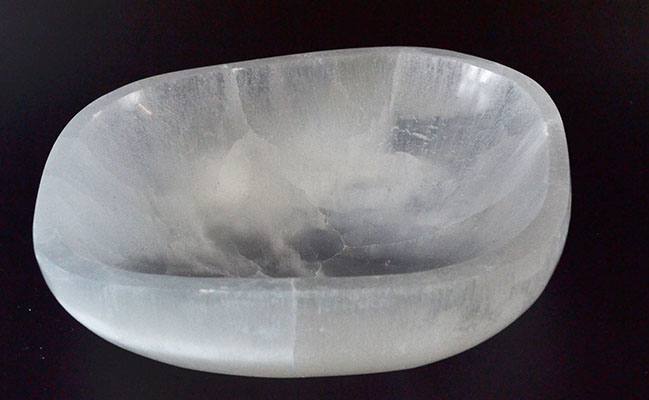 Salt bowl for spiritual or ritual use, made of natural salt crystal.