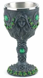 A detailed image of a Celtic-style chalice with green gemstone accents and intricate knotwork design.