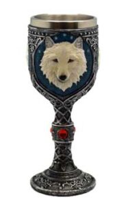 Ceremonial goblet featuring a wolf's head and Celtic patterns, symbolizing nature and spiritual conn.