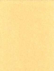 Close-up of pale yellow textured paper, suitable for Celtic spirituality and educational content.