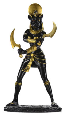 Statue of a black warrior figure holding two crescent-shaped blades, adorned with gold accents.
