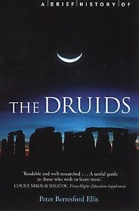 A crescent moon rising above Stonehenge-like stones under a dark night sky.