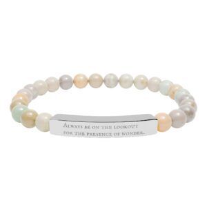 Elegant pearl bracelet with inspirational message for spiritual connection.