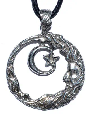 Pendant featuring a detailed Celtic tree design with a crescent moon and star charm.