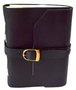Leather-bound journal with strap closure, used for Celtic spiritual practices and teachings.