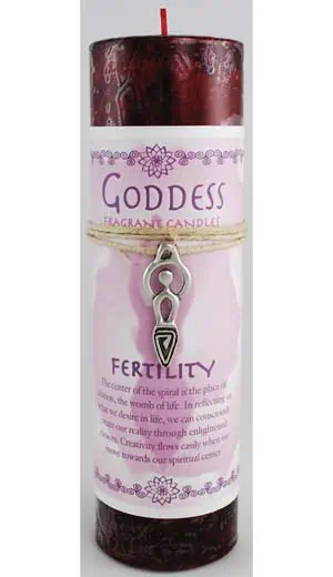 Red candle with Goddess fertility label, Celtic symbols, and decorative elements.