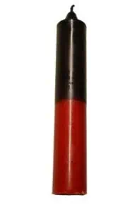 Candle with black and red sections, used in Celtic spiritual practices and rituals.