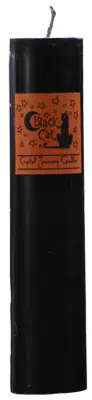 Black candle with orange label featuring a black cat, used in Celtic spiritual practices.