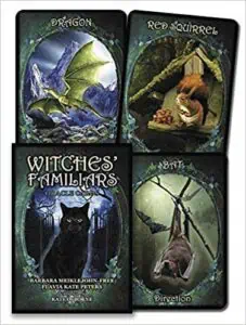 A set of four tarot-style cards featuring a dragon, red squirrel, black cat, and bat, used for Celti.