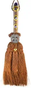 Druidic staff featuring gemstones, beads, and tassels, used in Celtic spiritual practices.