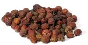 Dried Szechuan peppercorns, used in cooking and traditional practices, shown in a close-up image.
