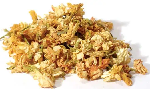 Dried flower petals, possibly for herbal or spiritual practices, on a white background.