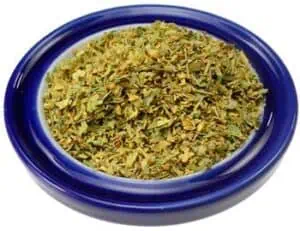 Herbs in a blue bowl, used in Celtic spirituality and nature-based rituals.
