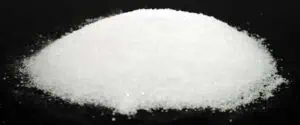 Salt pile on black background, used in Celtic spiritual practices and rituals.