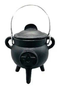 Black cauldron with a handle, used in Celtic spiritual practices and rituals.